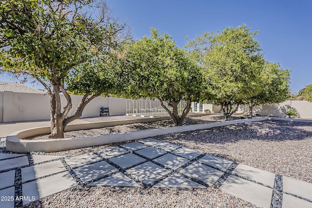 exterior space featuring a fenced backyard