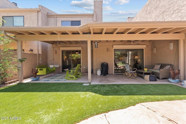 2313 S Grandview Ave, Tempe, AZ 85282 - back of property with a patio area, stucco siding, an outdoor hangout area, and a yard