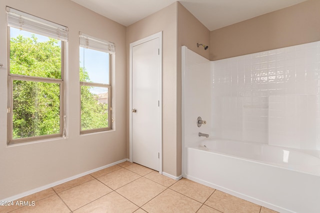 bathroom featuring tile patterned floors and shower / bathtub combination