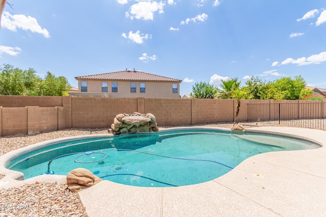 view of swimming pool featuring a patio