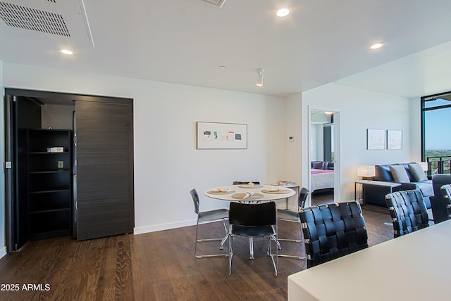 200 W Portland St Unit 1024, Phoenix, AZ 85003 - dining space featuring dark wood finished floors, baseboards, and recessed lighting
