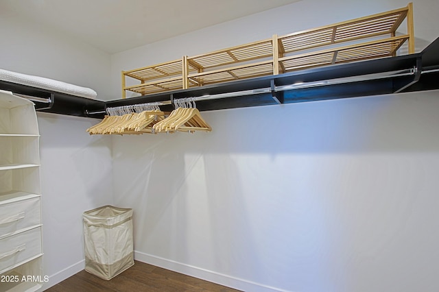 200 W Portland St Unit 1024, Phoenix, AZ 85003 - spacious closet with dark wood-style floors