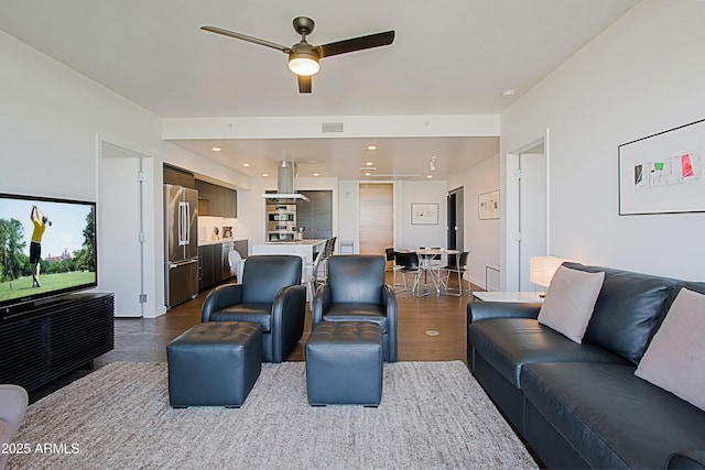200 W Portland St Unit 1024, Phoenix, AZ 85003 - living area with ceiling fan and dark wood-style floors