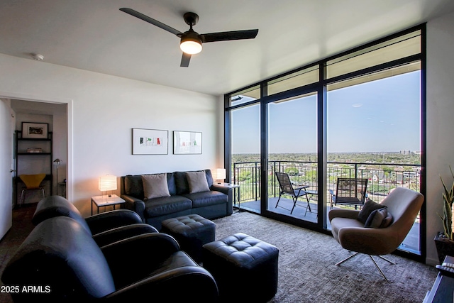200 W Portland St Unit 1024, Phoenix, AZ 85003 - carpeted living area featuring floor to ceiling windows and ceiling fan