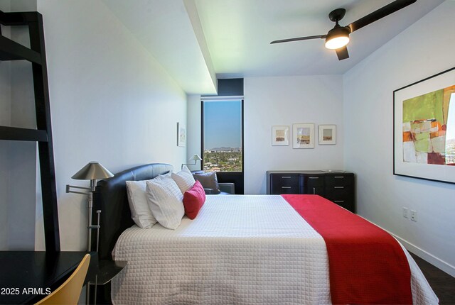 200 W Portland St Unit 1024, Phoenix, AZ 85003 - bedroom with wood finished floors and a ceiling fan