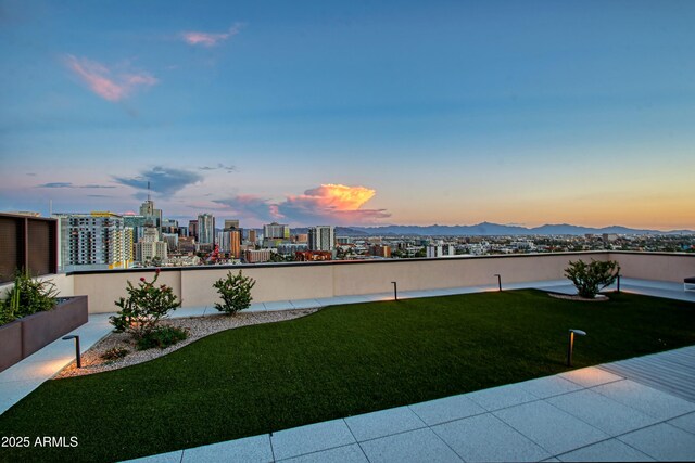 200 W Portland St Unit 1024, Phoenix, AZ 85003 - yard at dusk featuring a view of city and a yard