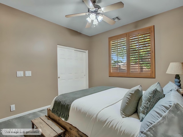 carpeted bedroom with baseboards, ceiling fan, and visible vents