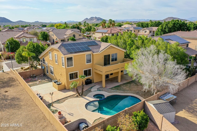 bird's eye view with a residential view and a mountain view