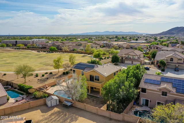 bird's eye view featuring a residential view and a mountain view