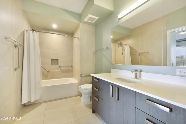 7120 E Kierland Blvd Unit 316, Scottsdale, AZ 85254 - bathroom featuring shower / bath combination with curtain, tile patterned floors, vanity, and toilet