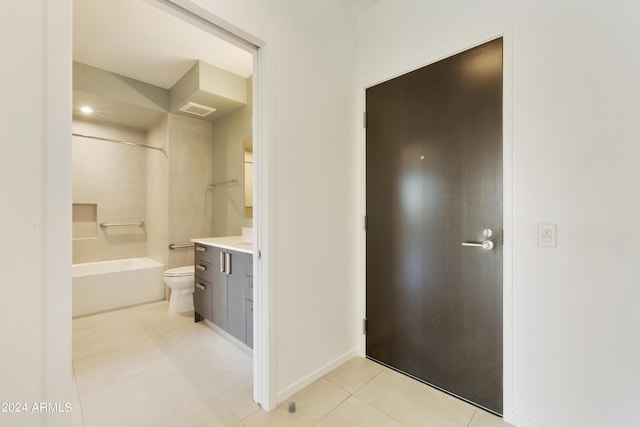 7120 E Kierland Blvd Unit 316, Scottsdale, AZ 85254 - bathroom with tile patterned floors, vanity, toilet, bathtub / shower combination, and baseboards