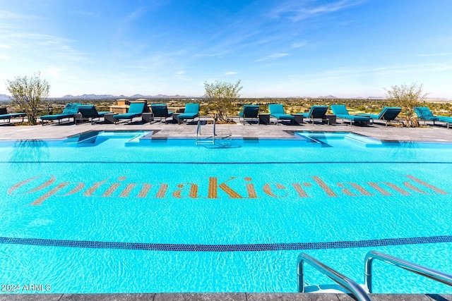 7120 E Kierland Blvd Unit 316, Scottsdale, AZ 85254 - community pool with a patio