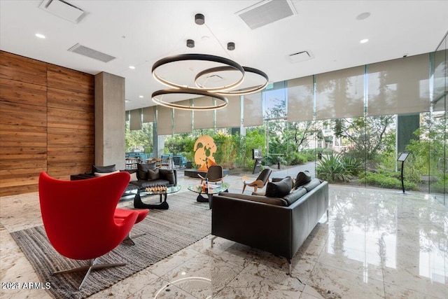 7120 E Kierland Blvd Unit 316, Scottsdale, AZ 85254 - common area with wood walls, a wall of windows, and recessed lighting