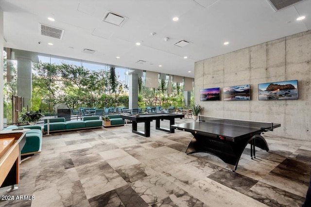 7120 E Kierland Blvd Unit 316, Scottsdale, AZ 85254 - playroom featuring a wall of windows and recessed lighting