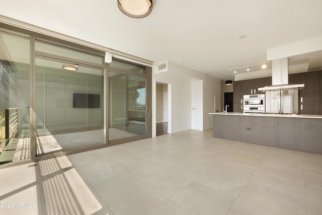 7120 E Kierland Blvd Unit 316, Scottsdale, AZ 85254 - unfurnished living room with track lighting