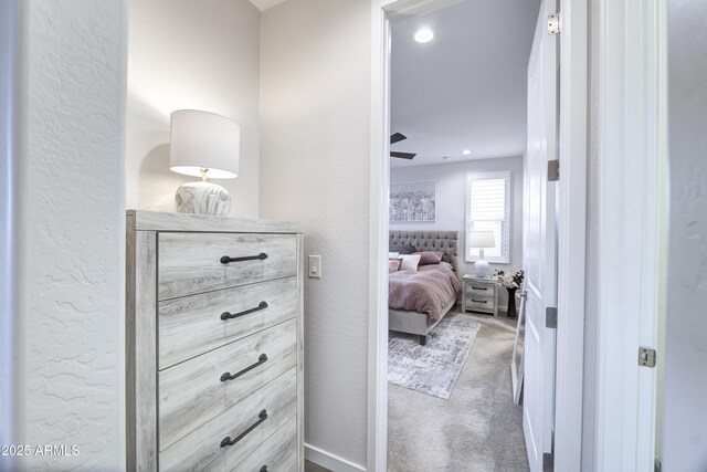 hall with carpet and recessed lighting