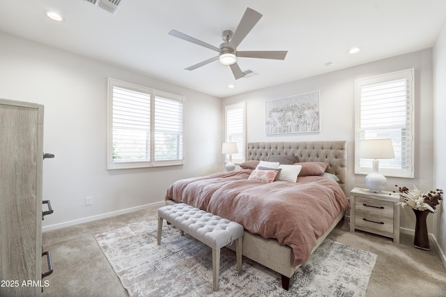 carpeted bedroom featuring baseboards, visible vents, and recessed lighting