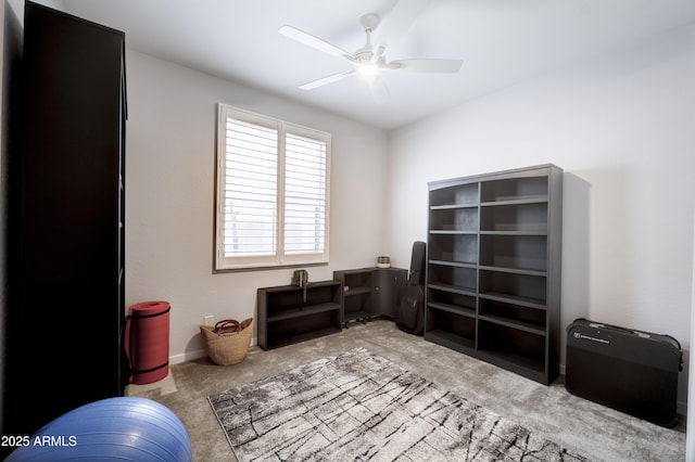 miscellaneous room featuring ceiling fan and carpet flooring