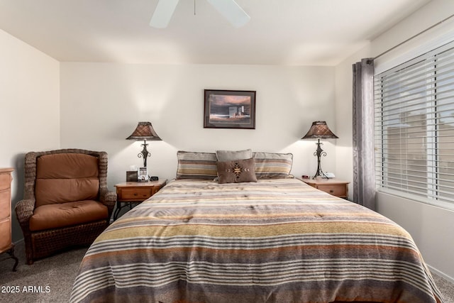 bedroom with ceiling fan and carpet flooring