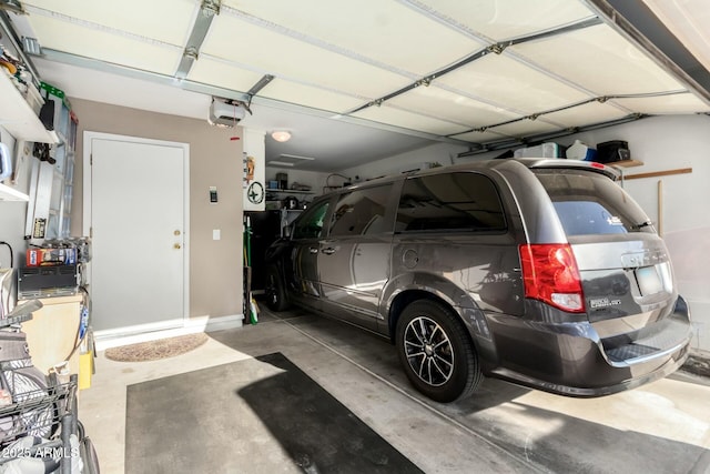 garage featuring a garage door opener