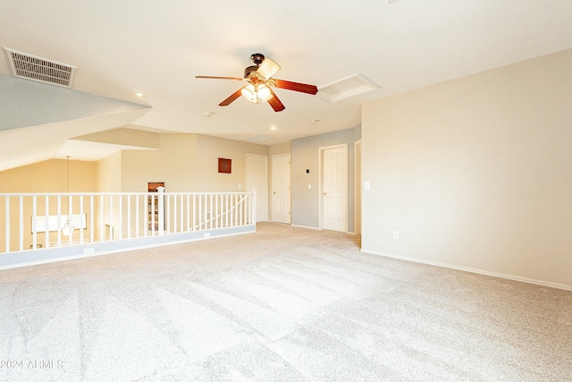 spare room featuring carpet flooring and ceiling fan