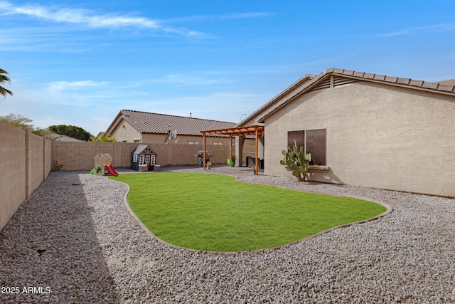 view of yard with a patio area and a fenced backyard