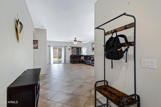 hall featuring light tile patterned flooring