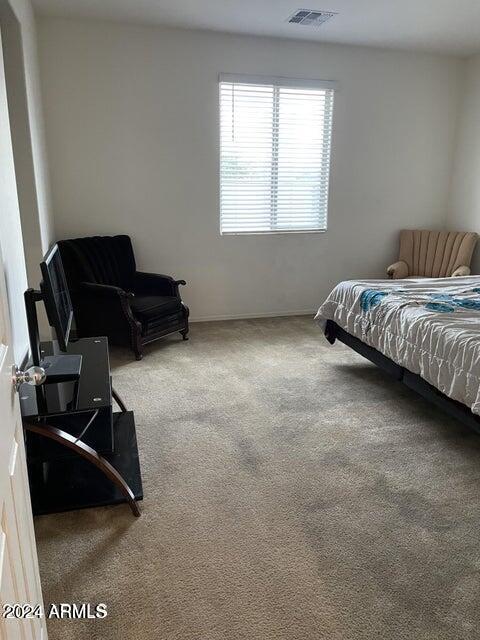 bedroom featuring carpet floors