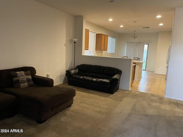 living room featuring light carpet