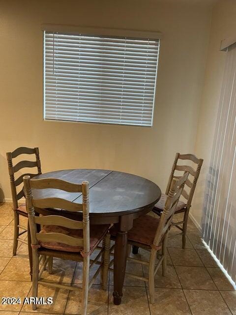 dining area with tile patterned floors