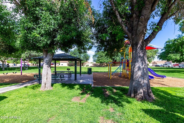 community jungle gym featuring a gazebo and a lawn