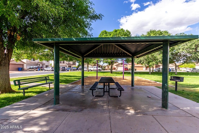 view of property's community featuring a lawn and a gazebo
