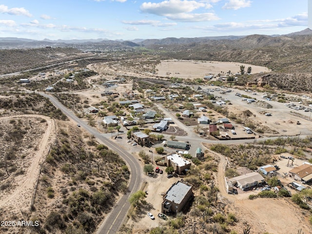 aerial view featuring view of desert and a mountain view