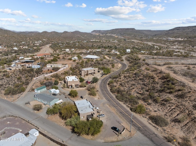 drone / aerial view with a desert view and a mountain view