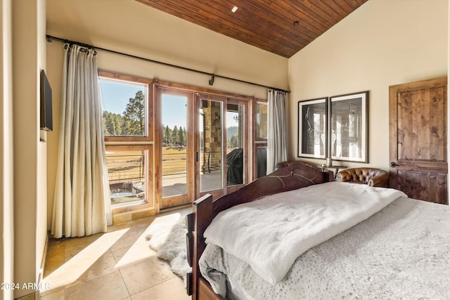 bedroom with access to outside, vaulted ceiling, and wood ceiling