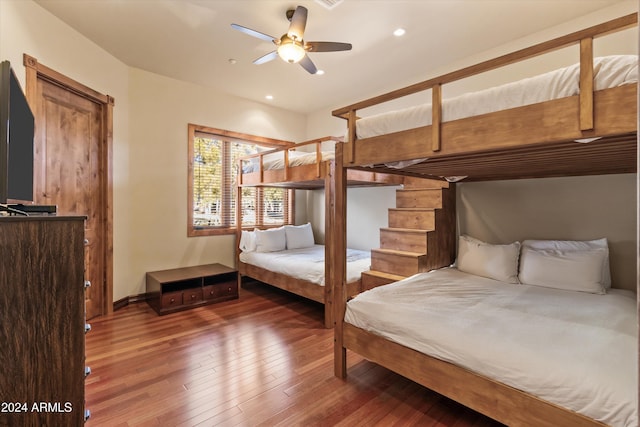 bedroom featuring wood-type flooring and ceiling fan