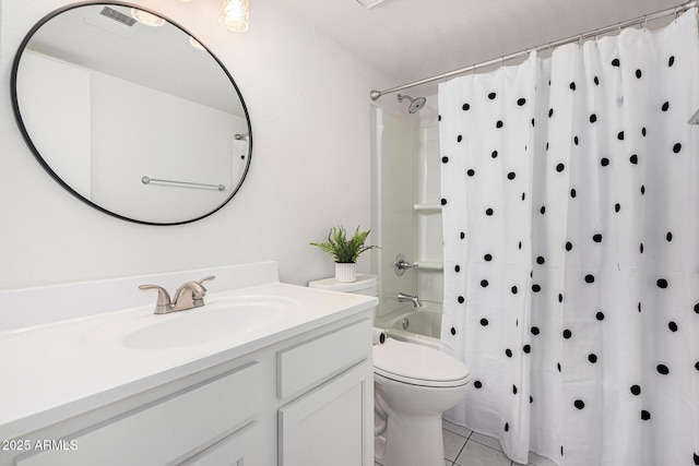 full bathroom featuring vanity, toilet, shower / bath combo with shower curtain, and tile patterned flooring