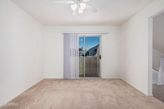 carpeted empty room with ceiling fan