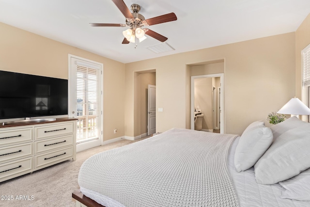 bedroom with visible vents, baseboards, light colored carpet, and ceiling fan