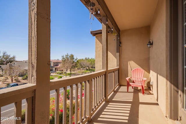 balcony featuring a residential view