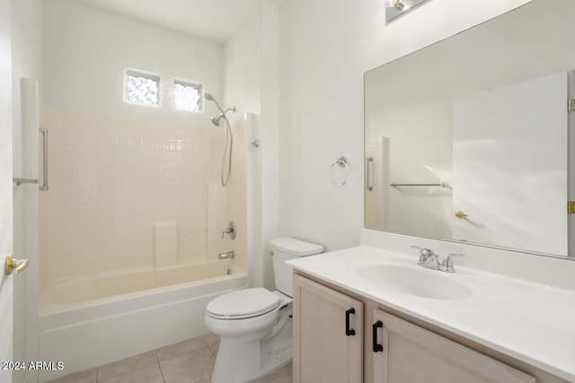 full bathroom featuring tile patterned flooring, shower / bath combination, vanity, and toilet