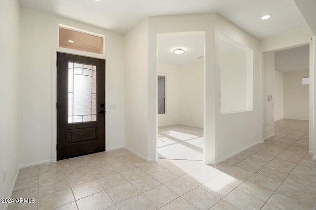 view of tiled foyer entrance