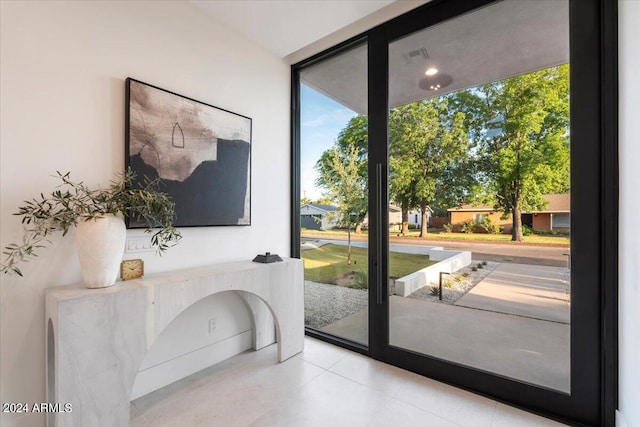 entryway with light tile floors