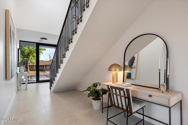 office space featuring light tile flooring