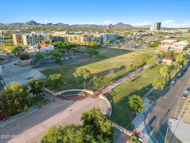 birds eye view of property featuring a mountain view