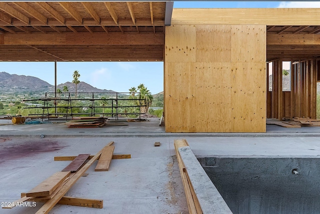 view of horse barn featuring a mountain view