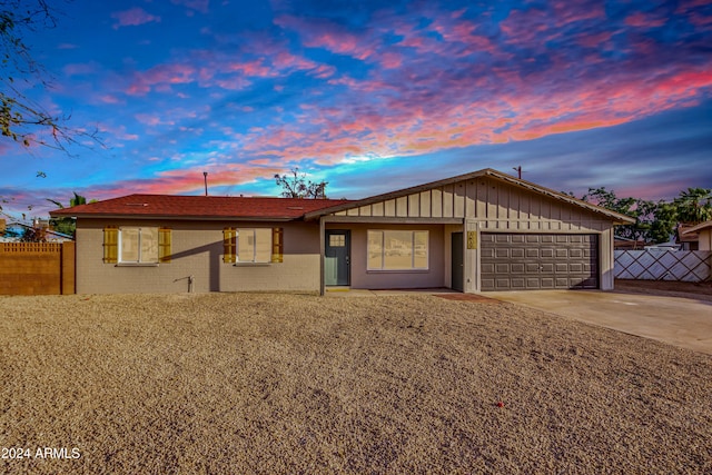 ranch-style home with a garage