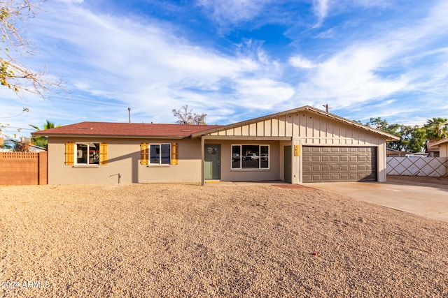 ranch-style home with a garage