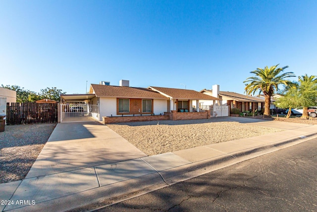 ranch-style house with a carport