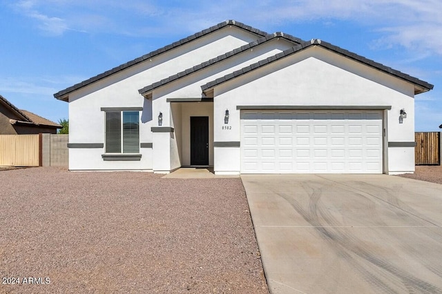 view of front of property with a garage